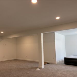 Spacious, empty basement lights